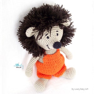 crochet hedgehog in overalls amigurumi pattern