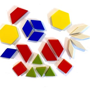 May include: A collection of colorful geometric shapes in red, blue, yellow, green, and off-white. The shapes include hexagons, diamonds, triangles, and trapezoids. The shapes are arranged on a white background.