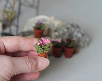 Miniature artificial rosy pink Violet. Crochet potted plant . Crocheted miniature flower violet. Dollhouse miniature. Fairy garden flower