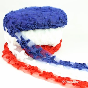 May include: Red, white, and blue star-shaped lace trim. The lace is made of a soft, stretchy material and features a 3D star design.