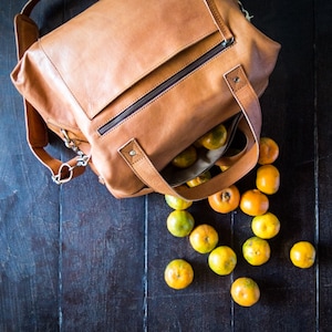 Leather messenger and weekender for men and women, handmade anniversary or wedding gift. Brown satchel, briefcase or carry on bag