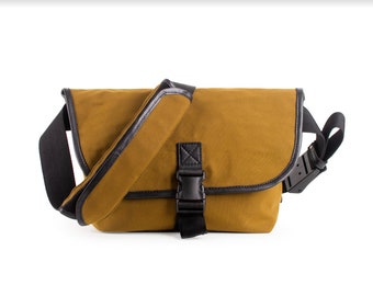 Crossbody messenger in canvas and Leather for men and women. everyday fold over bag in for laptop or travel bag. Handmade anniversary gift.