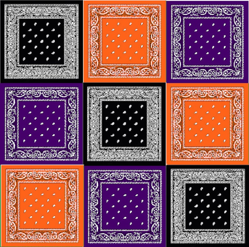 May include: Nine square patterned bandanas in black, orange, and purple. Each bandana has a white paisley border and white dots on the solid colour background.