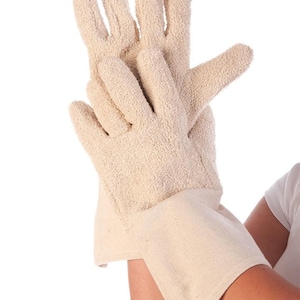May include: A pair of beige oven mitts with a textured, terrycloth-like surface. The mitts have a long cuff for added protection and are designed to protect hands from heat when handling hot cookware.