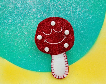 Sparkly toadstool badge / red mushroom brooch / fungi pin made with glitter fabric and felt