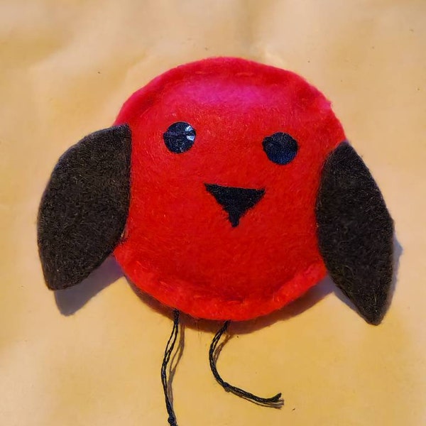 Handmade felt Christmas Robin brooch. Something fun to wear over the festive period.