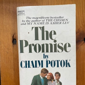 May include: A white paperback book cover with the title "The Promise" by Chaim Potok. The cover features a black and white illustration of three people.