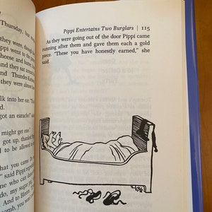May include: A black and white illustration of a person in bed with two shoes on the floor. The text in the image reads "Pippi Entertains Two Burglars | 115".  "As they were going out of the door Pippi came running after them and gave them each a gold piece. "These you have honestly earned," she said."