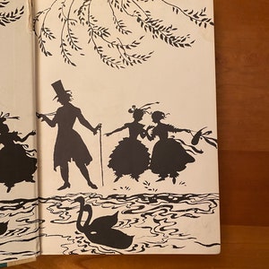 May include: Silhouette illustration of three people walking by a body of water with a swan swimming in the water. The people are wearing hats and dresses. The illustration is in black and white.