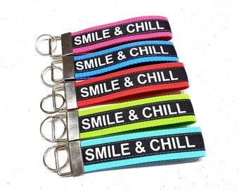 12.5 cm long keychain SMILE & CHILL can be ordered in five webbing colours