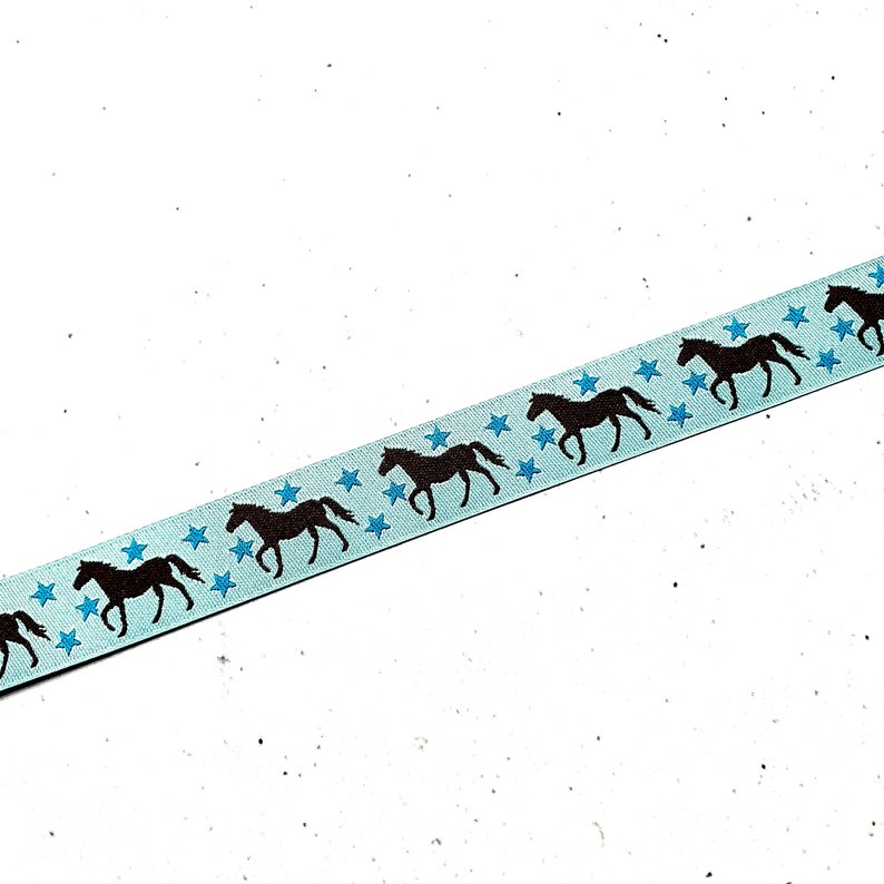 16 mm breite Webbänder mit Pferden und Sternen in türkis und kiwigrün Lieferung je Design in einem Stück türkis