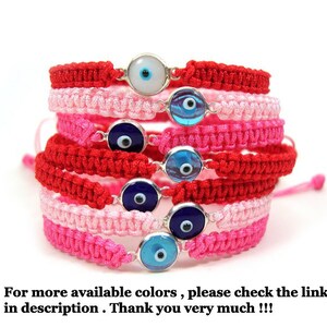 May include: A stack of red and pink string bracelets with blue and white evil eye charms. For more available colors, please check the link in description. Thank you very much!!!