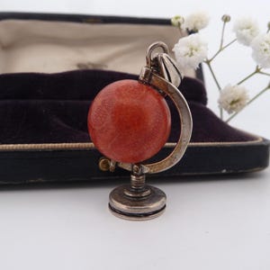 Vintage Silver Rotating Globe Charm or Pendant – Spinning Hardstone Earth on Tilted Axis – Collectible Travel Gift – 3cm