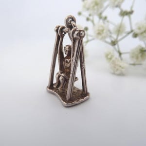 Vintage Nuvo Silver Mechanical Charm – Girl on Swing – Moving Parts - Actually swings.