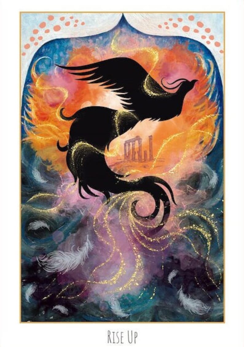 May include: An artistic print featuring a black phoenix rising against a backdrop of fiery orange and purple hues. Gold glitter accents the bird and surrounding clouds. The words "RISE UP" are at the bottom.