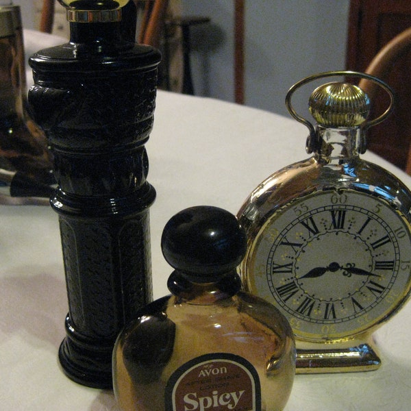 3 Vintage Avon After Shave Decanters. Amber brown water pump, Gold pocket watch, Avon Spicy amber brown bottle; 1970's Avon Collectible jars