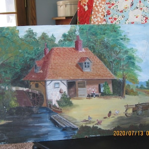 May include: A painting of a red brick house with a brown roof and a water wheel in front of it. The house is surrounded by green trees and a blue sky. There are chickens in the yard and a wagon in the background.