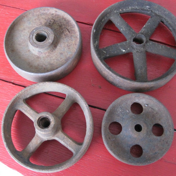 Vintage cast iron wheel, farm, Industrial factory Salvage, Steampunk, Metal Antique Farm Equipment. Belt pulley. Iron; metal gear; fly wheel