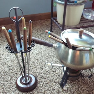 Vintage Fondue Set: Retro aluminum cooking kettle, lid; 12 forks; stand; Sterno pot; teak wood handle. Cook at the table self service dining