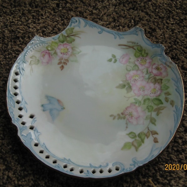 Vintage Hand painted signed G Peterson plate. Gold trimmed porcelain plate, scalloped, sculptured, open work; 8". Blue bird, flowers; gold