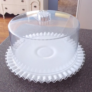 Vintage Cake Plate and cover: White milk glass footed round platter. Serving tray, clear dome lid. Ruffled, fluted pedestal dish. Cake Safe