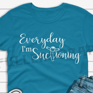 everyday i'm suctioning shirt, trach shirt, tracheotomy shirt, suctioning shirt, special needs shirt. trach life, trach care trach tie