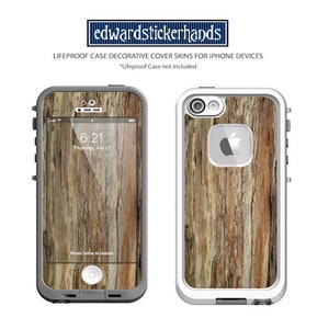 May include: A wood grain decorative cover skin for a LifeProof phone case. The skin is a light brown with darker brown streaks. The skin is designed to fit an iPhone. *Lifeproof Case not included*.