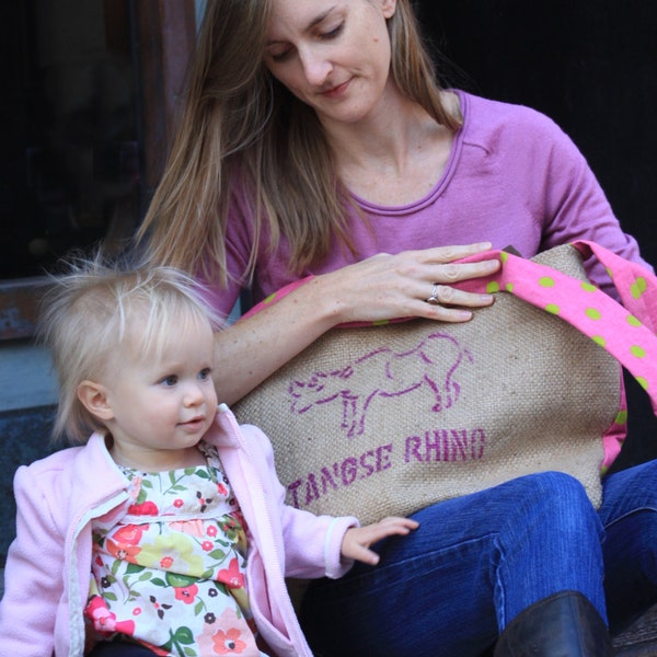 Large cross-body bag with Rhino stamp, featuring all upcycled materials