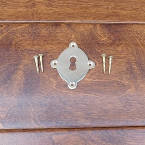 BB152KPB Cast Brass Key Escutcheon Plate.