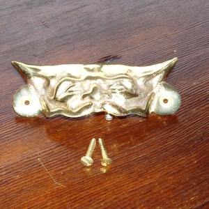 BB410. National cash register drawer cup pull. Cast Brass 3.5&quot; overall width