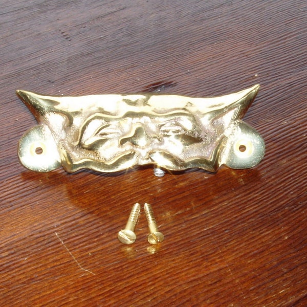 BB410. National cash register drawer cup pull. Cast Brass 3.5" overall width