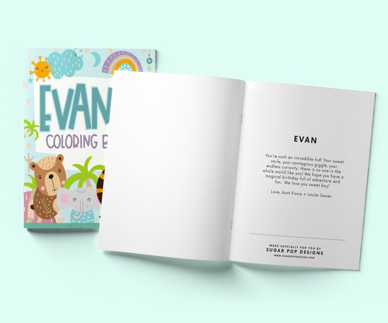 May include: A personalised colouring book with a blue cover featuring the name "EVAN" in large, colourful letters. The cover also has a cute illustration of a bear and an elephant in a jungle setting. The inside of the book has a message for Evan, wishing him a happy birthday and expressing love from Aunt Fiona and Uncle James.