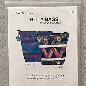 May include: A sewing pattern for making two small bags called "Bitty Bags" by Cindi Edgerton. The pattern includes tissue paper foundations for making twenty-four 12-inch strips. The bags are 6 inches by 6 1/2 inches and 5 1/2 inches by 6 inches.