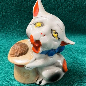Whimsical ceramic dog pin cushion