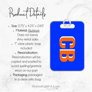 May include: Blue luggage tag with the letters "CB" in white and orange. The tag is made of aluminum and measures 2.75 inches by 4.25 inches. It includes a 7-inch clear plastic loop.