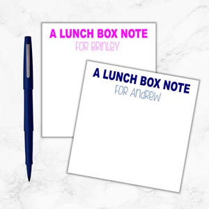 May include: Two white note cards with the text "A Lunch Box Note" in pink and blue. The top card says "For Brinley" and the bottom card says "For Andrew".