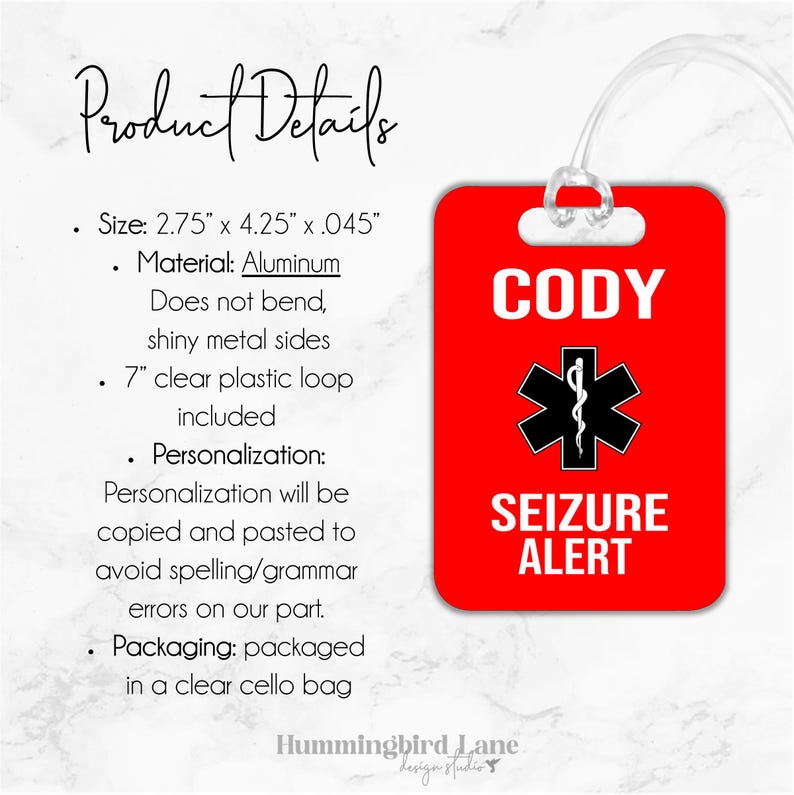 May include: Red luggage tag with a white star of life symbol and the text "CODY SEIZURE ALERT". The tag is made of aluminum and has a clear plastic loop.