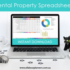 May include: A laptop computer displaying a spreadsheet with colourful charts and graphs. The spreadsheet is titled "Annual Cashflow" and "Property Expenses". The laptop is on a white desk with a mug, a phone, and a black cat figurine. The text "INSTANT DOWNLOAD" is displayed on the screen. The website address "www.allaboutplanners.com.au" is displayed at the bottom of the screen.
