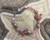 Central Asian bracelet with old beads, ceramic birds pink beads