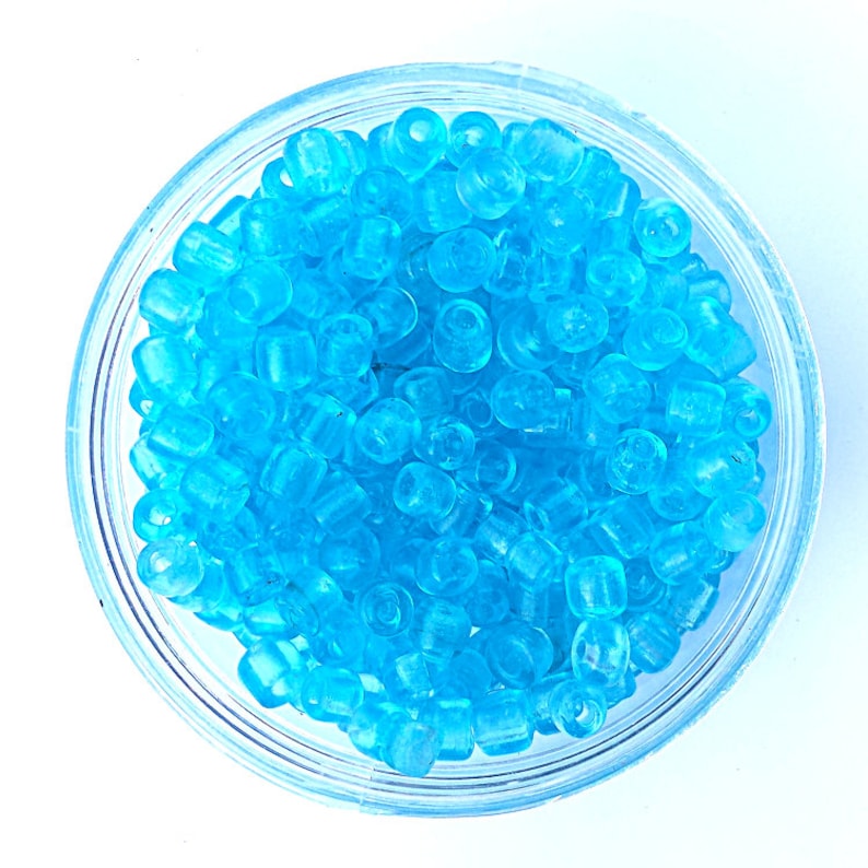100 x Light Blue Mini Tile Crow Glass translucent Beads Size 7mm x 3mm with a 2mm hole