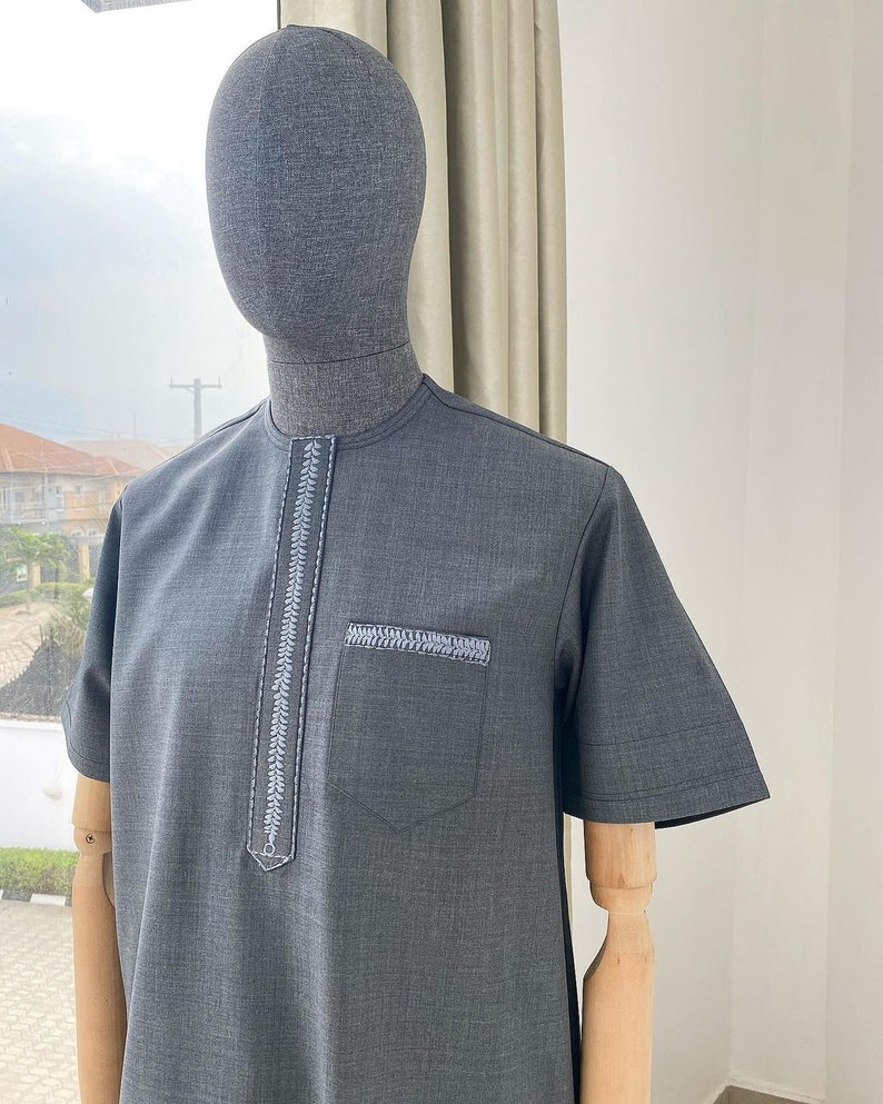 An Irish grey traditional embroidery senator kaftan.