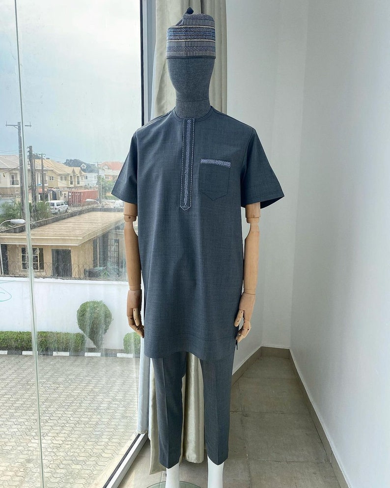 An Irish grey traditional embroidery senator kaftan.