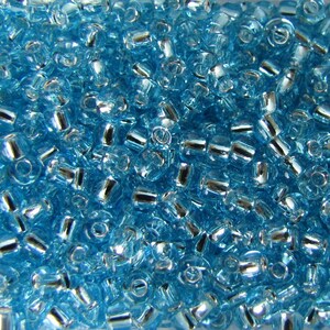 8/0 Silver lined Lt Aqua Seed Beads, 10 grams Seed Beads,# 4981 Aqua Seed Beads, Solver  lined Seed beads. Beads Japanese Seed Beads  #472
