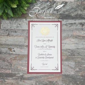 May include: A maroon and white graduation announcement card with a gold seal featuring the letters "A&M". The card announces the graduation of Hera Lynn Albright from Texas A&M University, College of Engineering, with a Bachelor of Science in Leadership Development, Cum Laude. The card also includes the text "Gig'em!" and "Class of 2024".