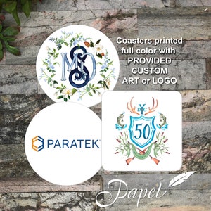 May include: Set of three round coasters with white backgrounds. One coaster features a blue and white floral design with the initials "M & S" in the center. Another coaster features a logo for "Paratek". The third coaster features a blue and green crest with the text "D.Y.C. 50 ONE CLARK YOUNG" and a fish and hunting rifle design. The text "Coasters printed full color with PROVIDED CUSTOM ART or LOGO" and "Papel" are also visible.