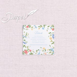 May include: A white card with a floral border and blue text that reads "Details" and "FOR ADDITIONAL WEDDING INFORMATION, INCLUDING ACCOMMODATIONS OPTIONS, PLEASE VISIT OUR WEDDING WEBSITE SYDNEYANDCHARLES.COM".