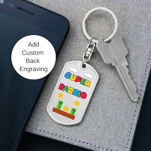 Super Daddio Game Key Chain, New Dad Keychain, Father&#39;s Day Gift, Personalized Gift For Gamer Dad, Gift for Dad, Custom Engraved Key Cha
