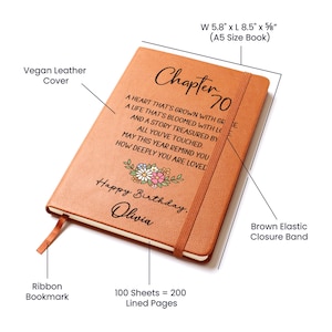 May include: A brown vegan leather journal with the text "Chapter 70" and a floral design. The journal has a ribbon bookmark and an elastic closure band. It measures 5.8" x 8.5" x 5/8" and contains 100 sheets (200 lined pages).