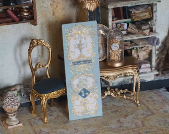 May include: A miniature dollhouse room with a blue and gold patterned wallpaper, a small chair, a table with a glass dome clock, and a rug on the floor.