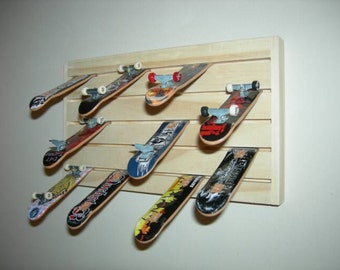 Teck-deckrek, display en opslag voor fingerboard-skateboards